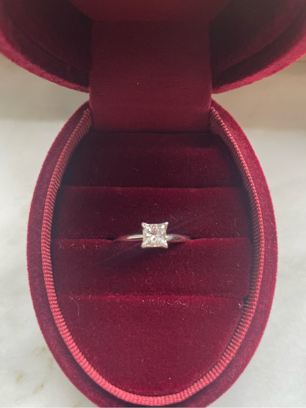 White gold .46 karat engagement ring, size 4 3/4 but can be sized